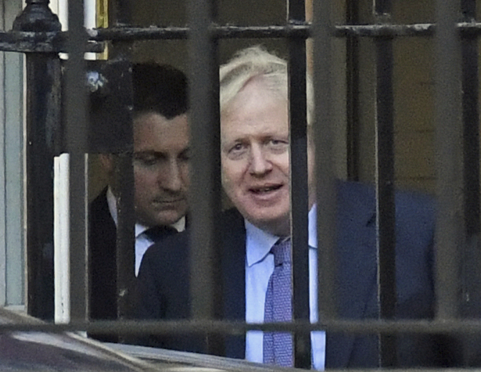 British Prime Minister Boris Johnson leaves from the back of Downing Street, London, on his way to Brussels for the European EU Summit, Thursday Oct. 17, 2019. Photo: Kirsty O'Connor, PA via AP