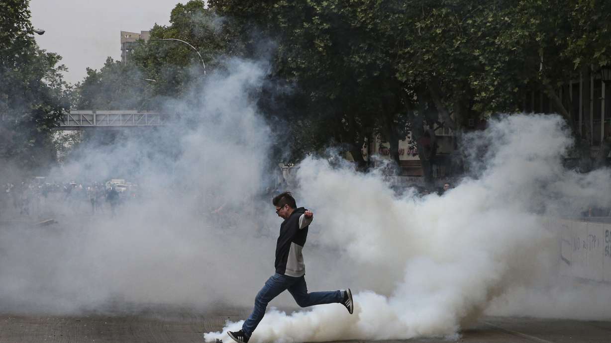 Chile's president rolls back subway fare hike amid protests