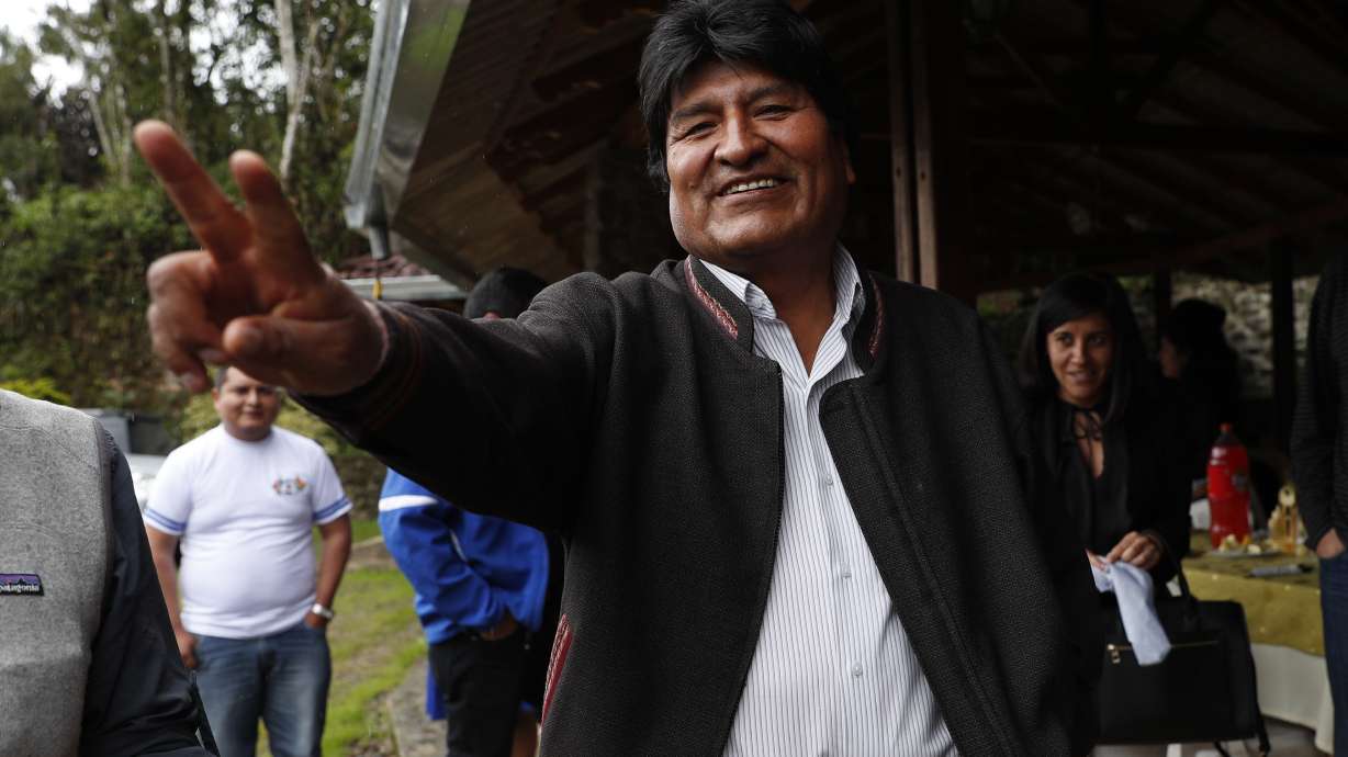 Bolivians pick between Evo Morales and change in tight vote