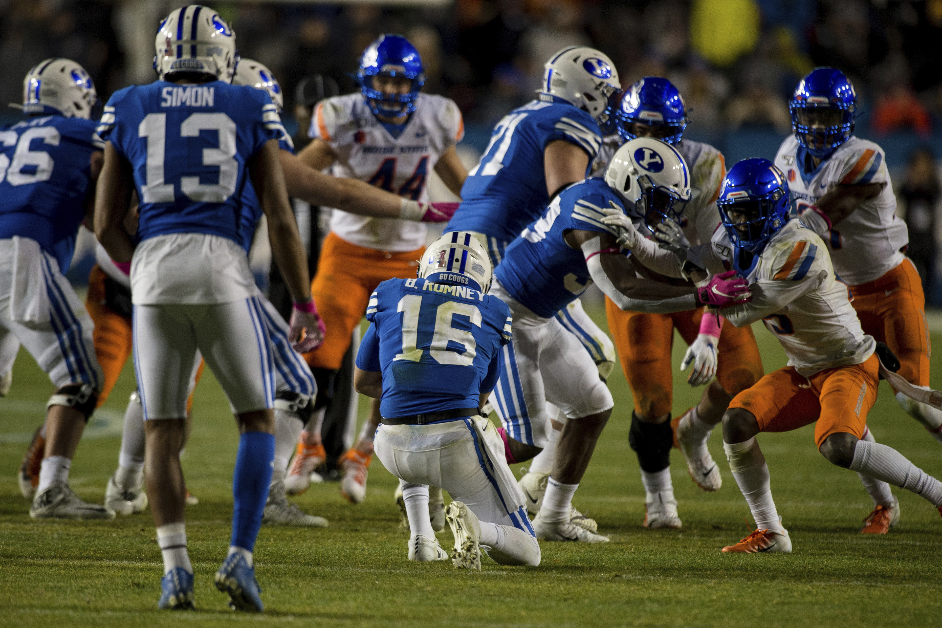 BYU quarterback Baylor Romney (16) kneels in victory formation in the second half of an NCAA football game against Boise State Saturday, Oct. 19, 2019, in Provo, Utah. (AP Photo, Tyler Tate)