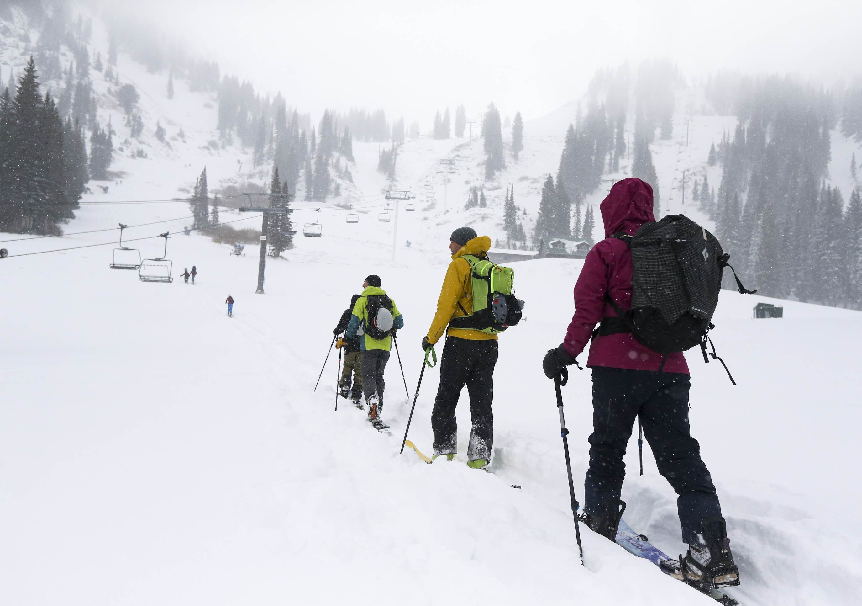 A group of skiers and snowboarders heads out from the Wildcat base area at Alta Ski Resort in Little Cottonwood Canyon to enjoy the first substantial snowfall of the year on Sunday, Oct. 20, 2019. (Colter Peterson, KSL)