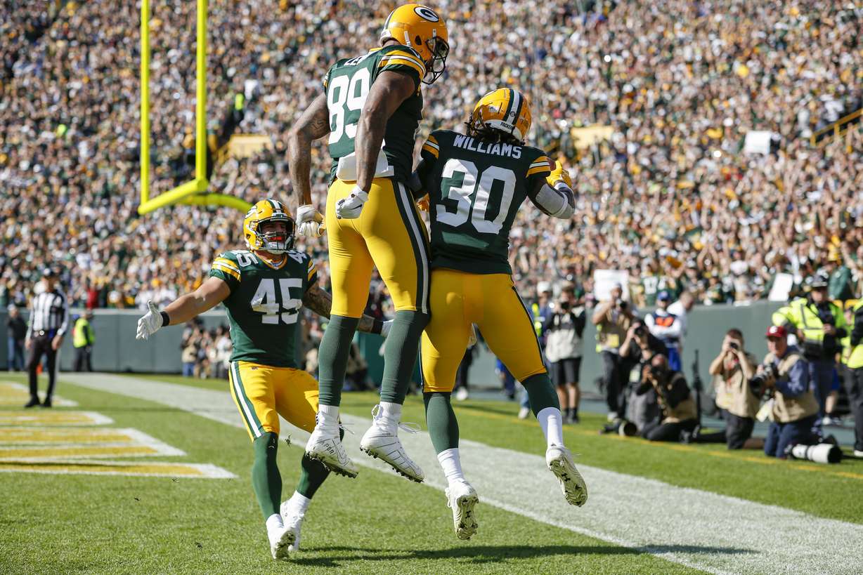Green Bay Packers running back Jamaal Williams (30), tight end Marcedes Lewis (89) and fullback Danny Vitale celebrate a touchdown during an NFL football game between the Green Bay Packers and Oakland Raiders Sunday, Oct. 20, 2019, in Green Bay, Wis. (Photo: Matt Ludtke, AP)