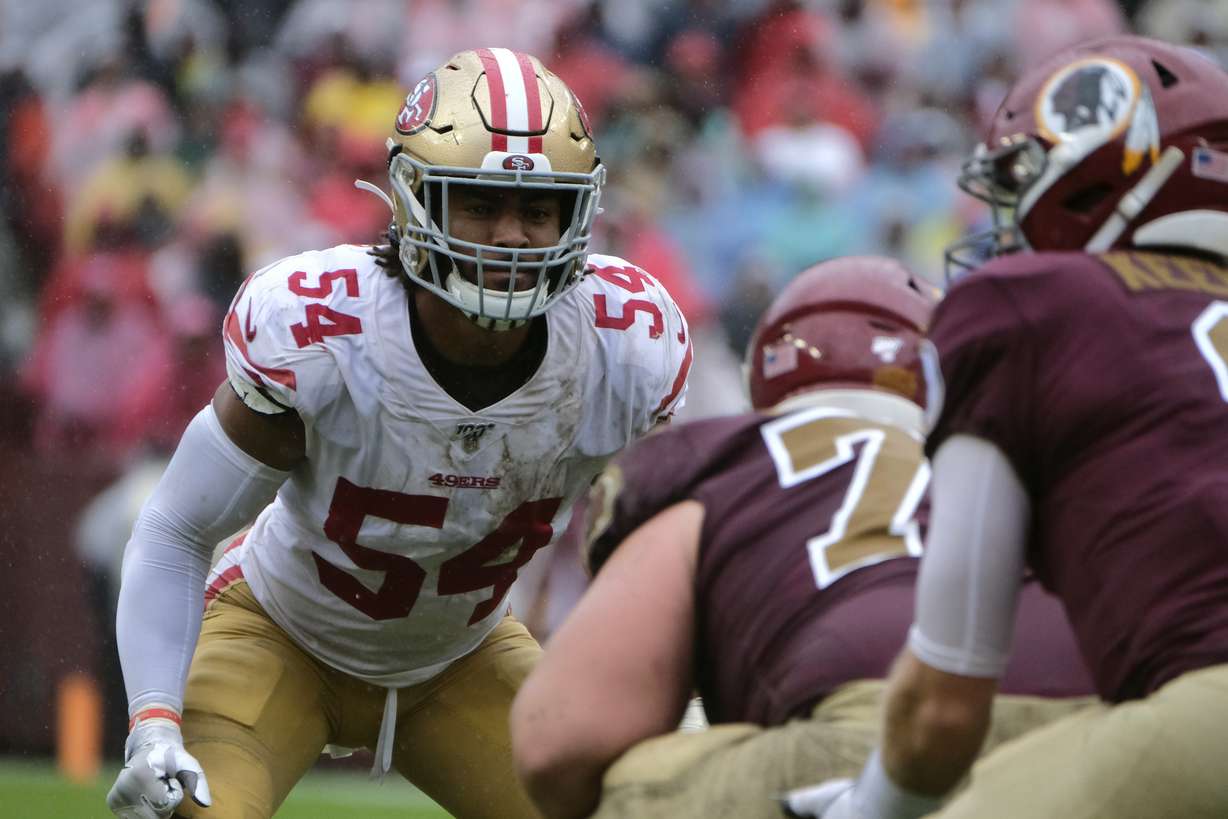 San Francisco 49ers middle linebacker Fred Warner (54) stands on the line of scrimmage in the first half of an NFL football game against the Washington Redskins, Sunday, Oct. 20, 2019, in Landover, Md. (AP Photo/Mark Tenally)