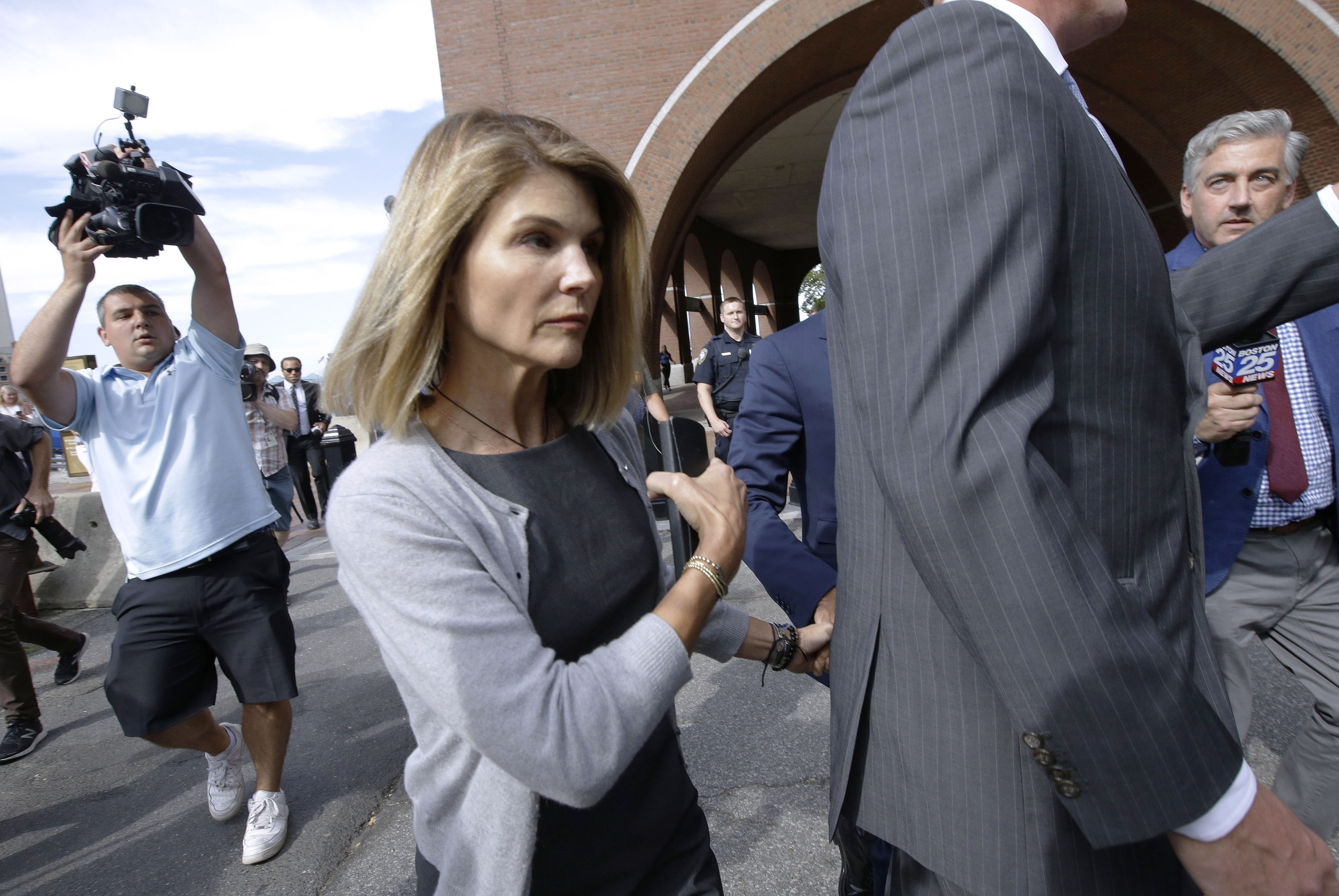 Lori Loughlin, other parents charged again in college scheme