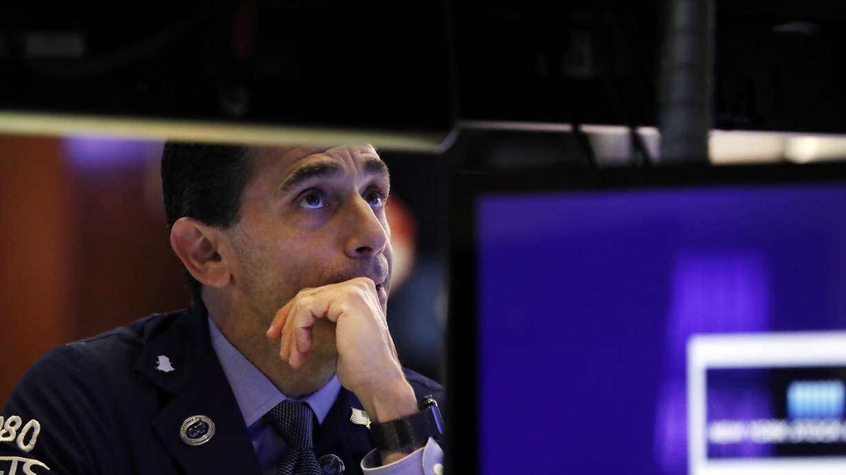 Asian shares mixed as earnings drive modest Wall St gains