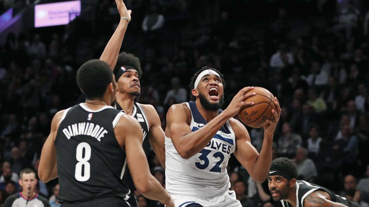Irving scores 50 but misses last shot, Wolves top Nets in OT