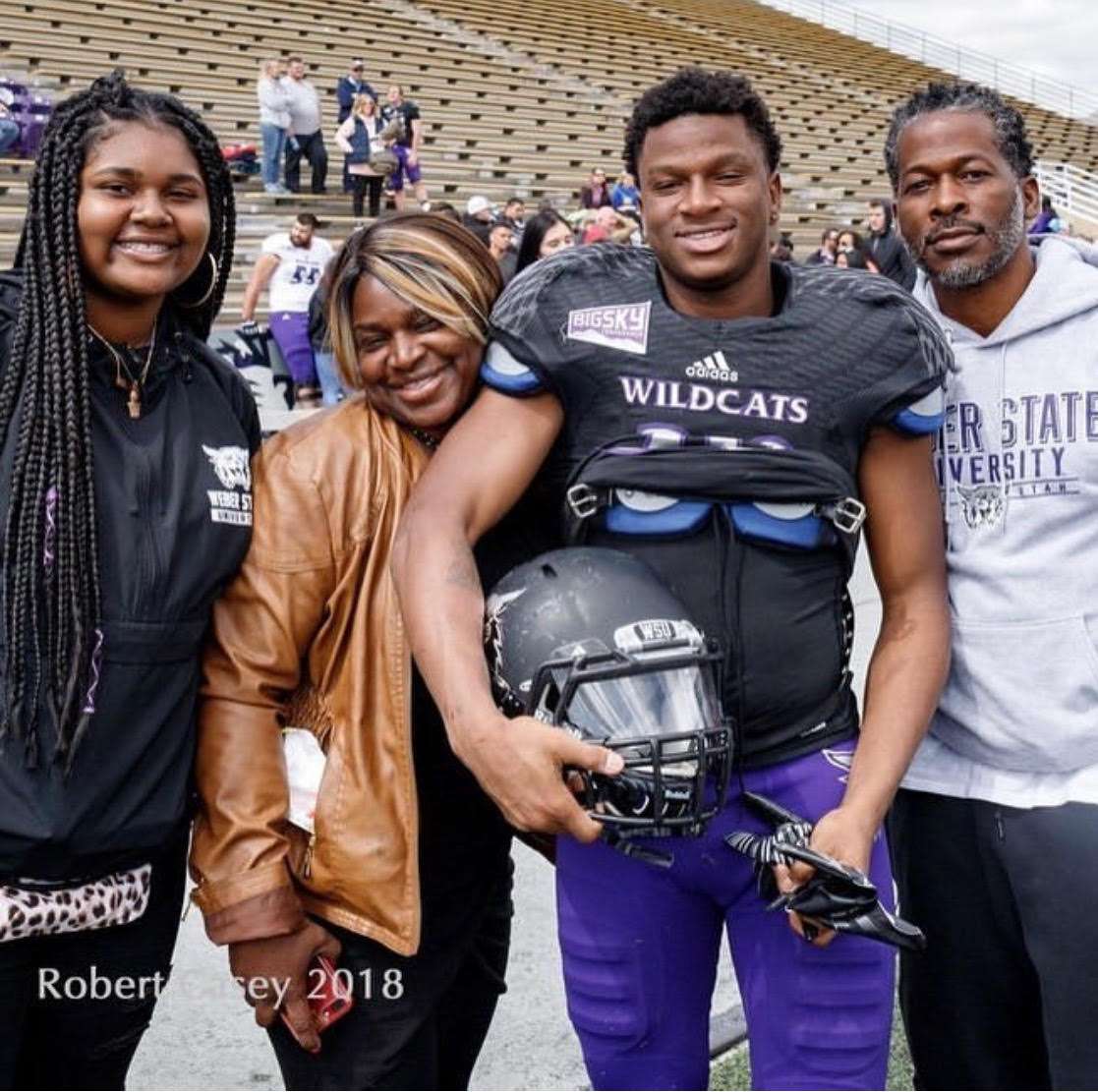 Eddie Heckard poses with his family after a Weber State game (Photo: Courtesy of Heckard family)