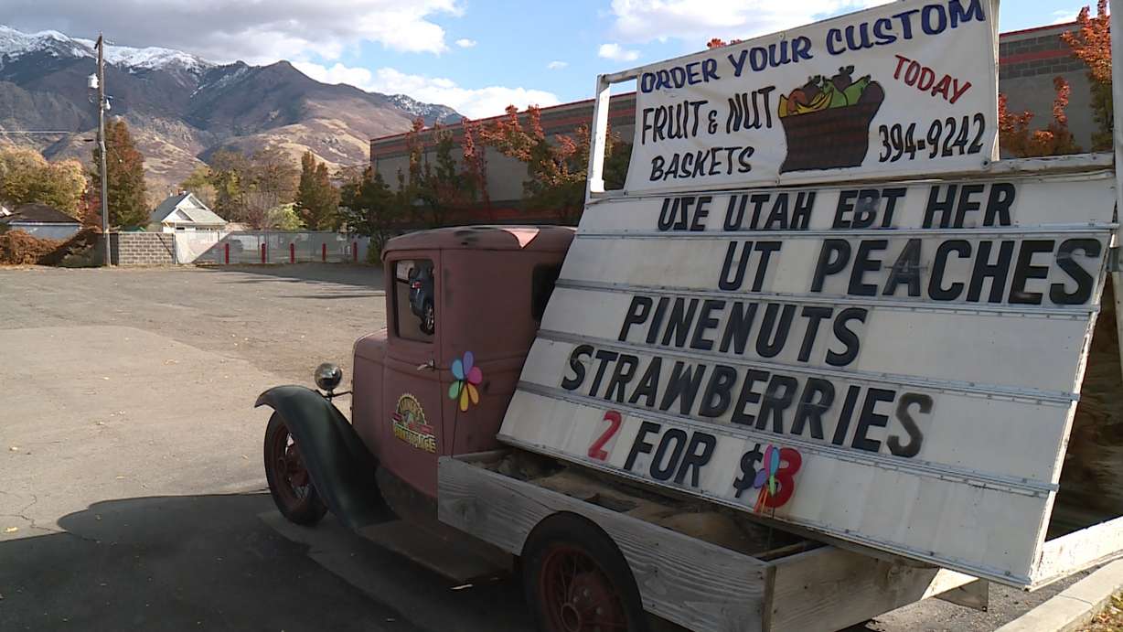 The sign outside Carlo's Produce in Ogden announces the store's closure after 35 years in the community. (Photo: Mike Anderson, KSL TV)