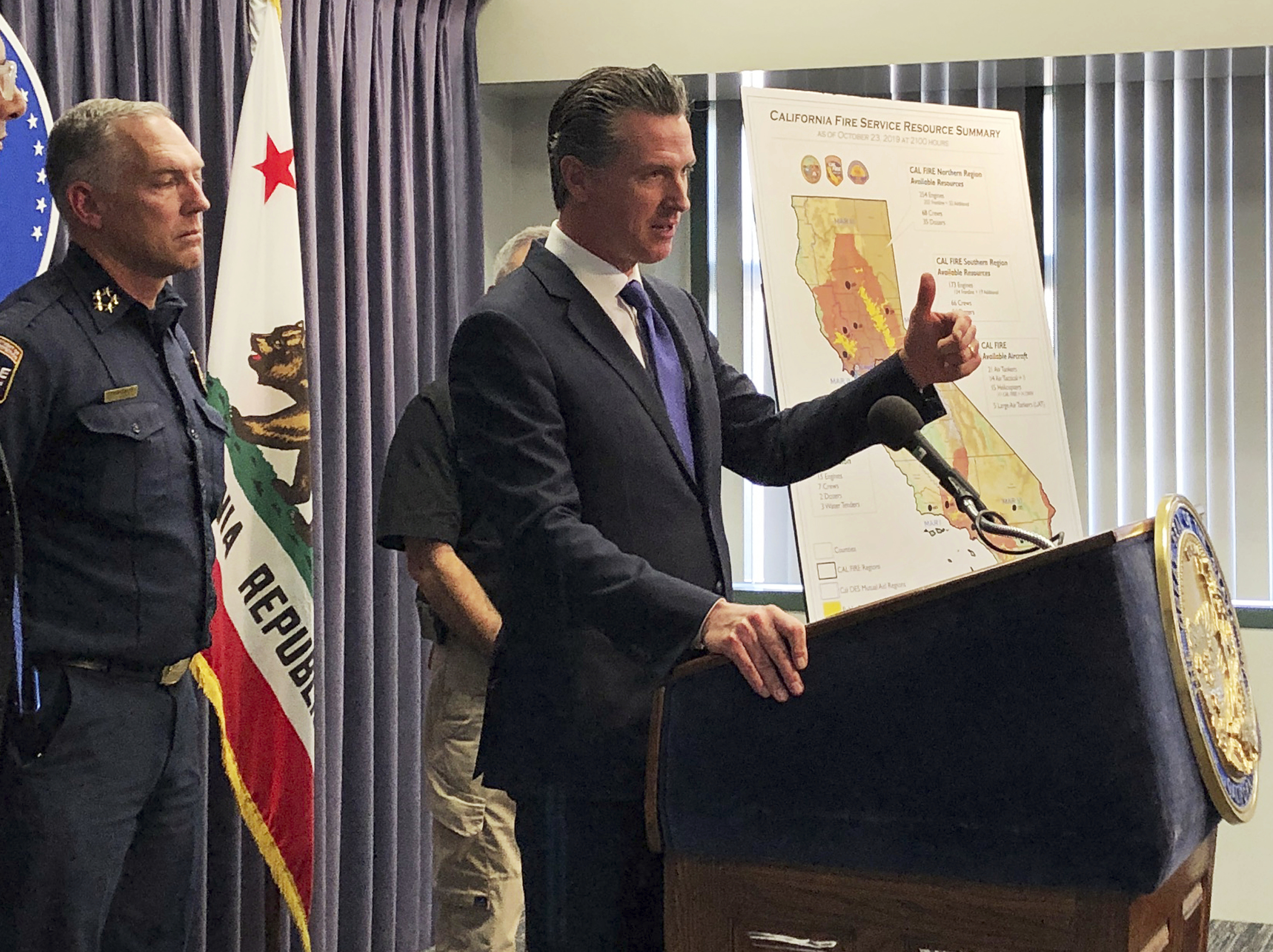 California governor "owns" blackouts, takes political risk