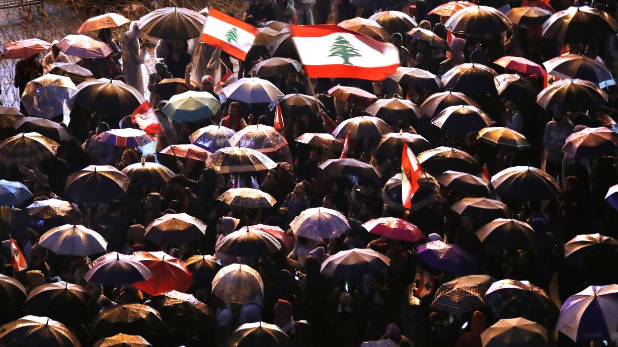 The Latest: Hezbollah chief asks supporters to exit protests