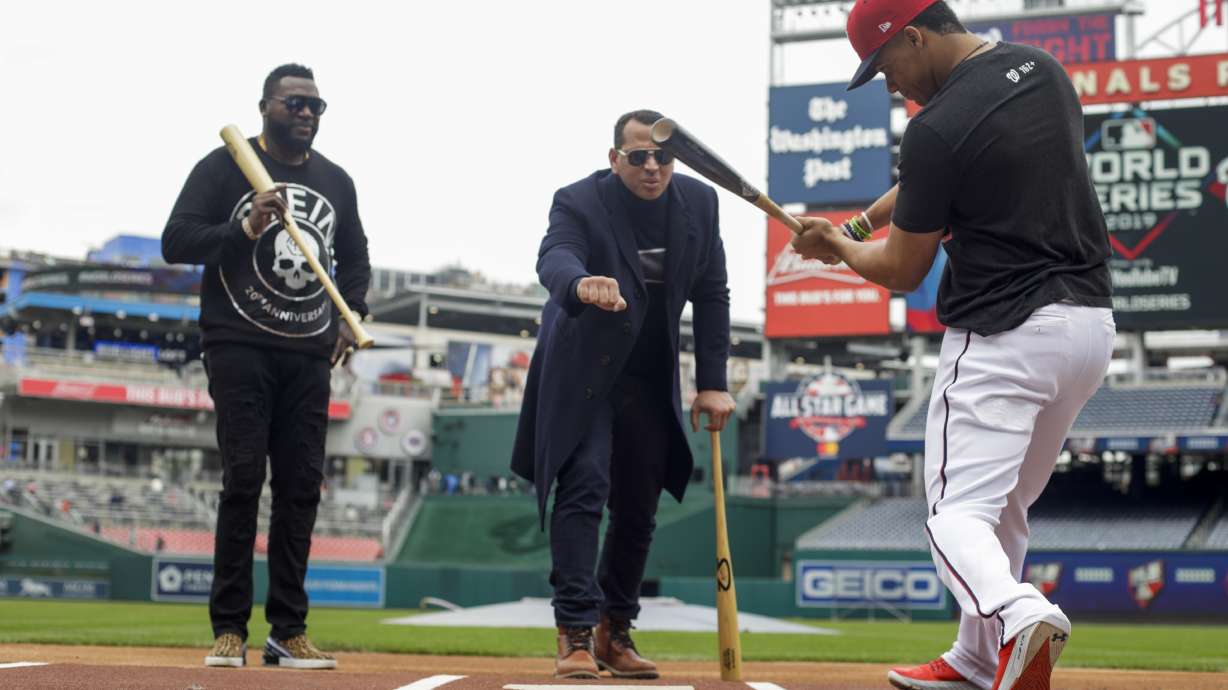 The Latest: Astros cut their deficit to 2-1
