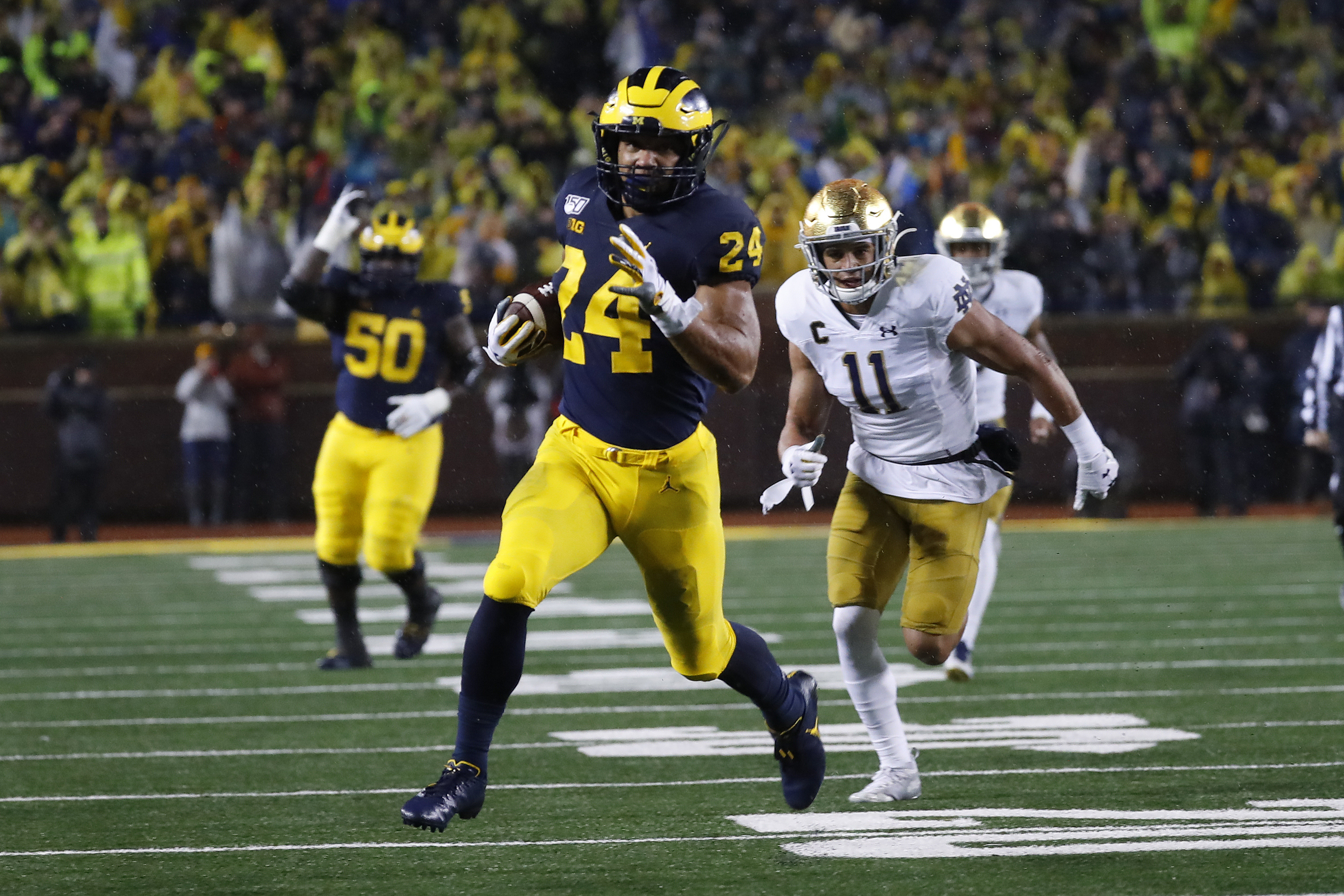 No. 19 Michigan routs No. 8 Notre Dame 45-14 in rain