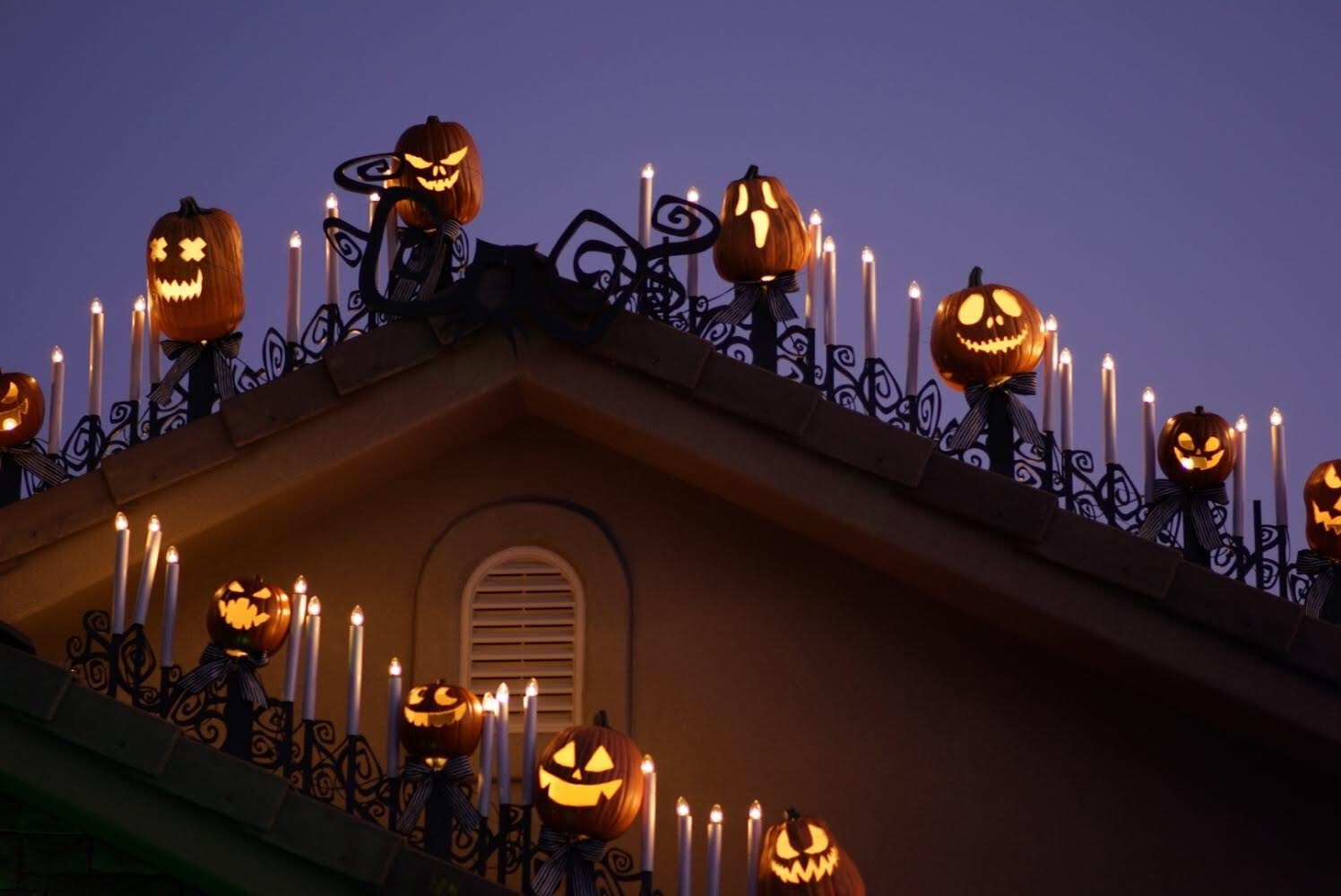 A close up view of decorations created by Dixie State University professor Josh Pedersen with inspiration from Disneyland's Haunted Mansion attraction and the movie "Nightmare Before Christmas" are seen in St. George, Utah. The Spectrum newspaper reports Pedersen studied more than 200 images of the attraction to model the design as close to the original as possible. (Shane Stewart via AP)