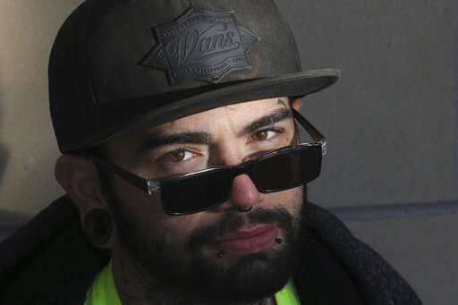 This Thursday, Oct. 24, 2019 photo, shows Jeffrey Manzanares, in Sandy, Utah. Utah health officials continue to see a steady stream of people suffering from vaping-related lung illnesses as the state's rate of cases is more than six times the national rate. Manzanares is among them. He lost nearly 50 pounds was hospitalized for 17 last month after vaping THC and nicotine. (AP Photo/Rick Bowmer)