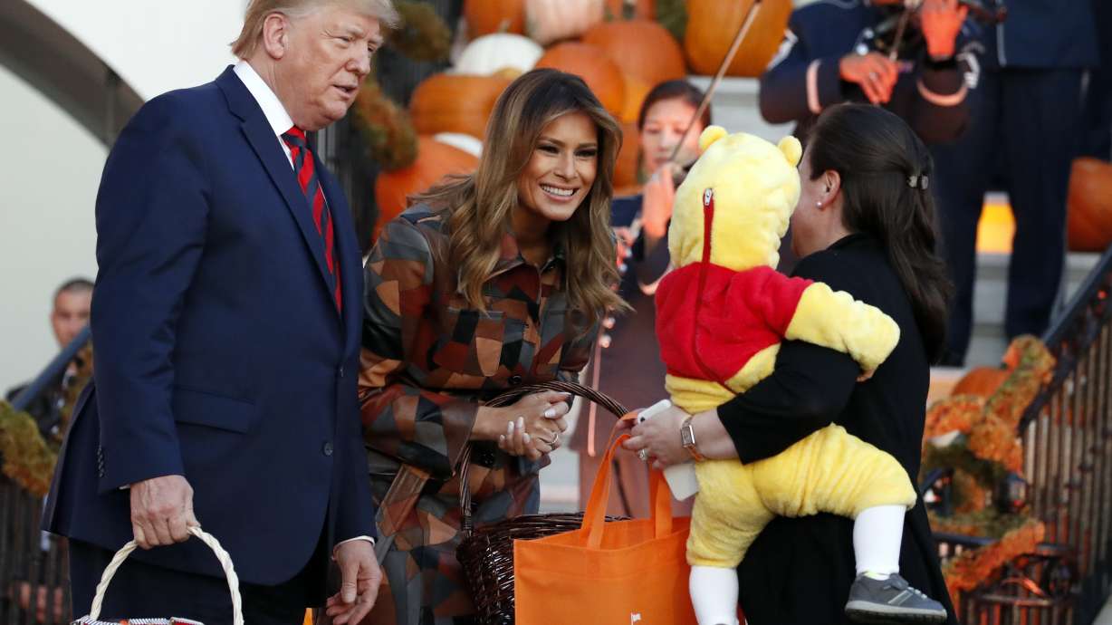 Trumps hand out Halloween candy, greet kids at White House