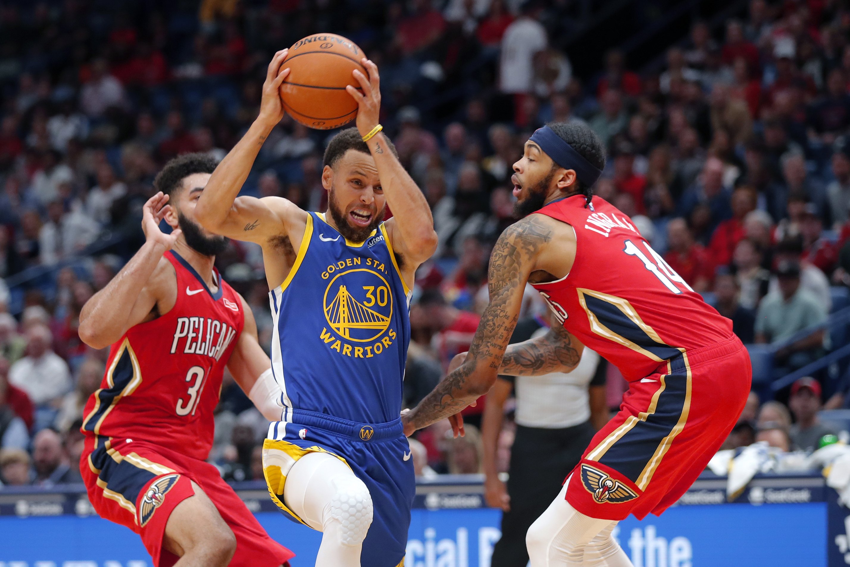 Curry, Green key Warriors' first win, 134-123 over Pelicans