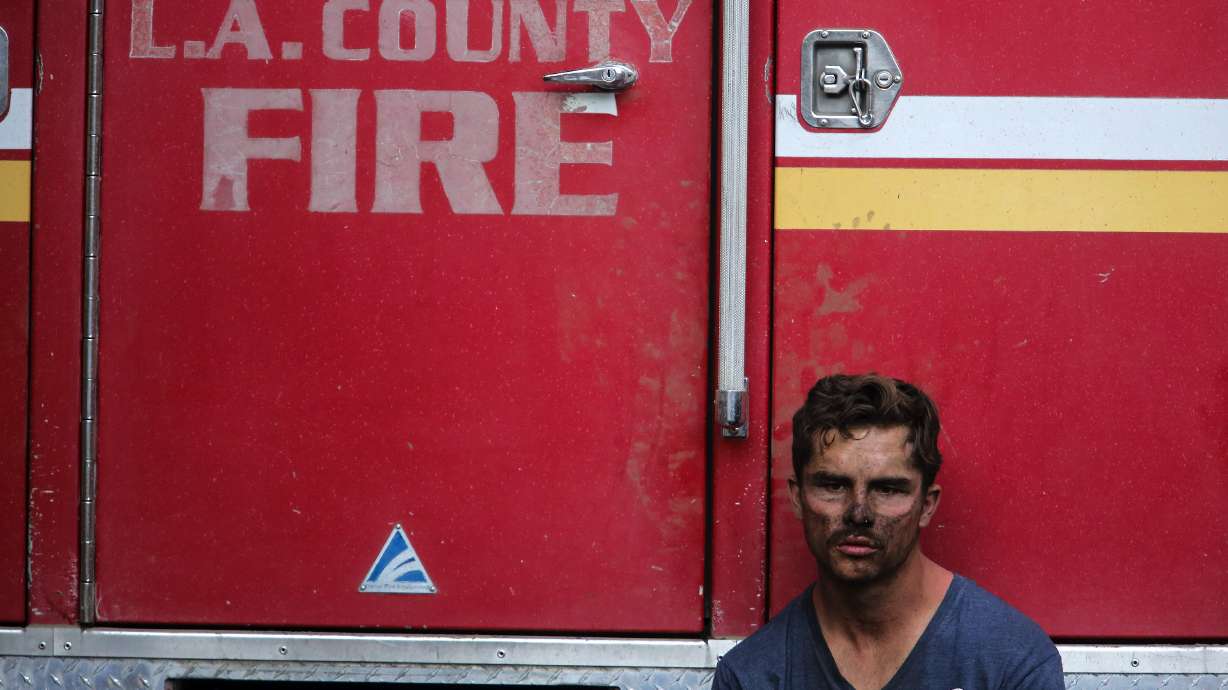 Crews battle California blazes before windstorms return