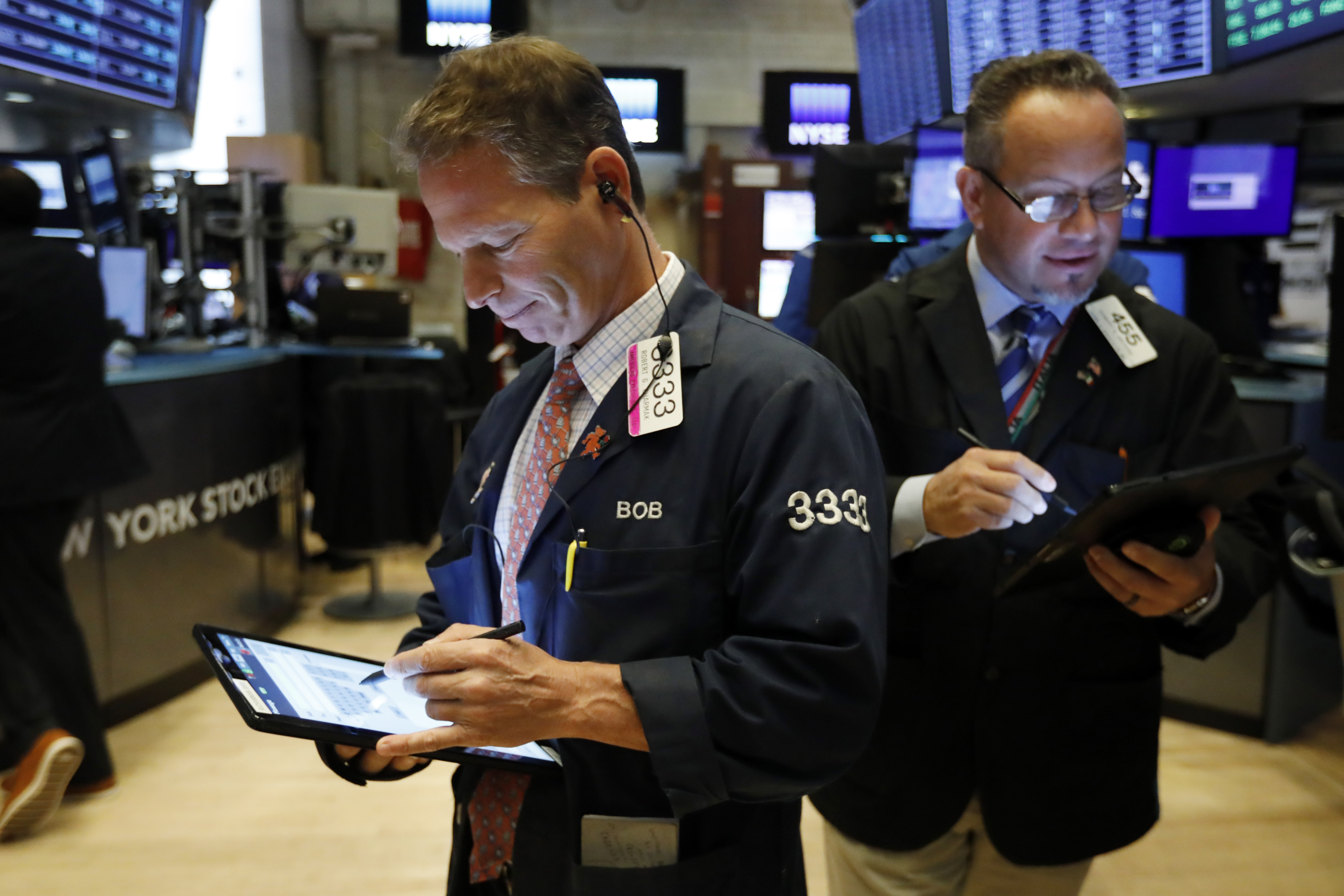 Asian shares mostly lower following Wall Street losses