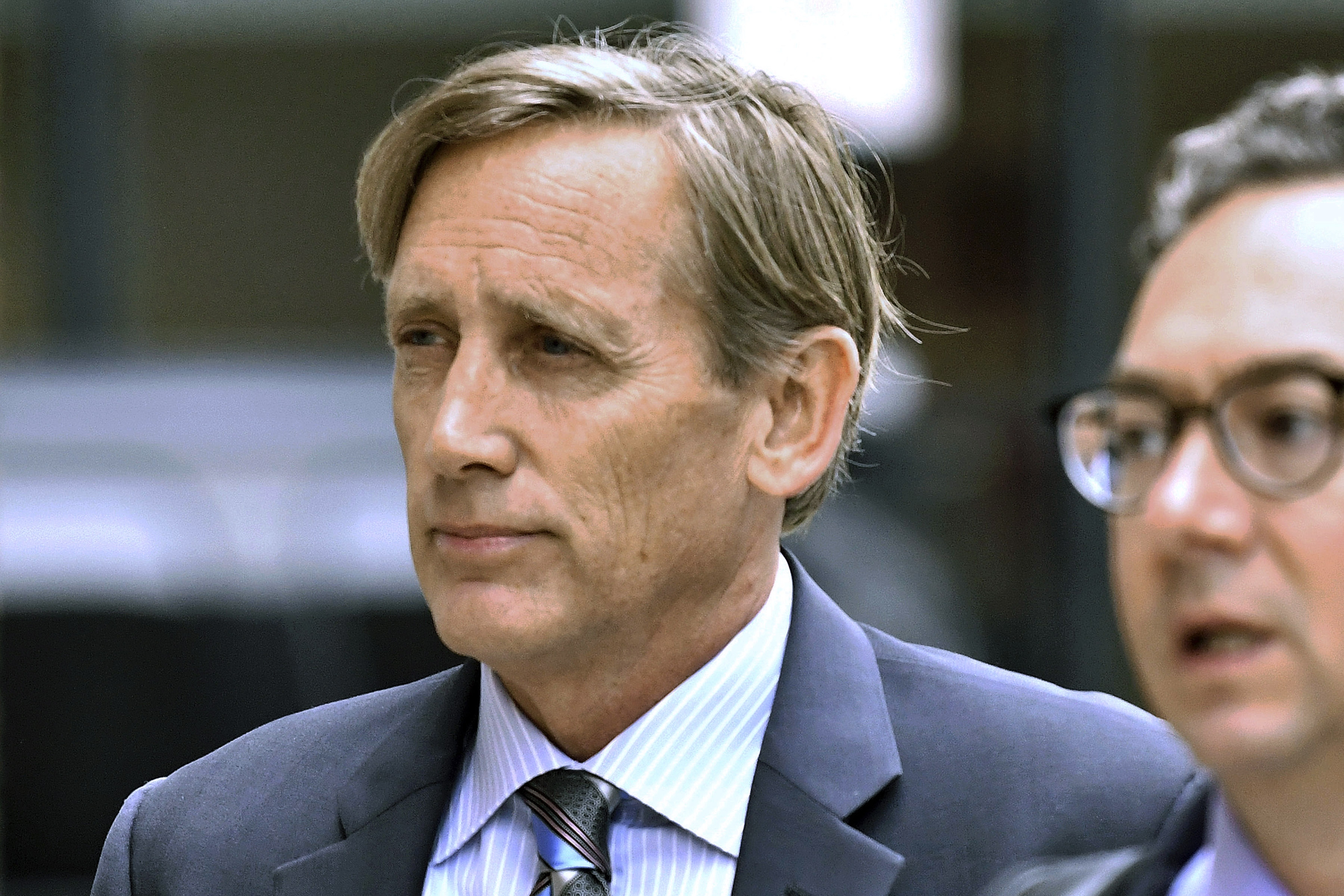 Former surfing executive gets 2 months in prison