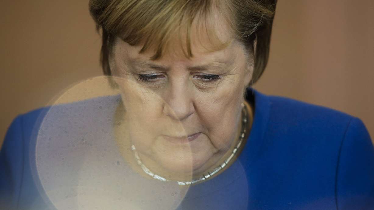 Merkel's conservatives in Germany seek an end to sniping