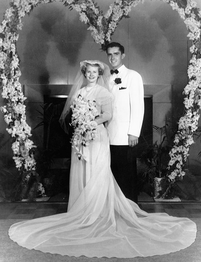 M. Russell Ballard and Barbara Bowen Ballard smile in an official wedding photo from 1951.