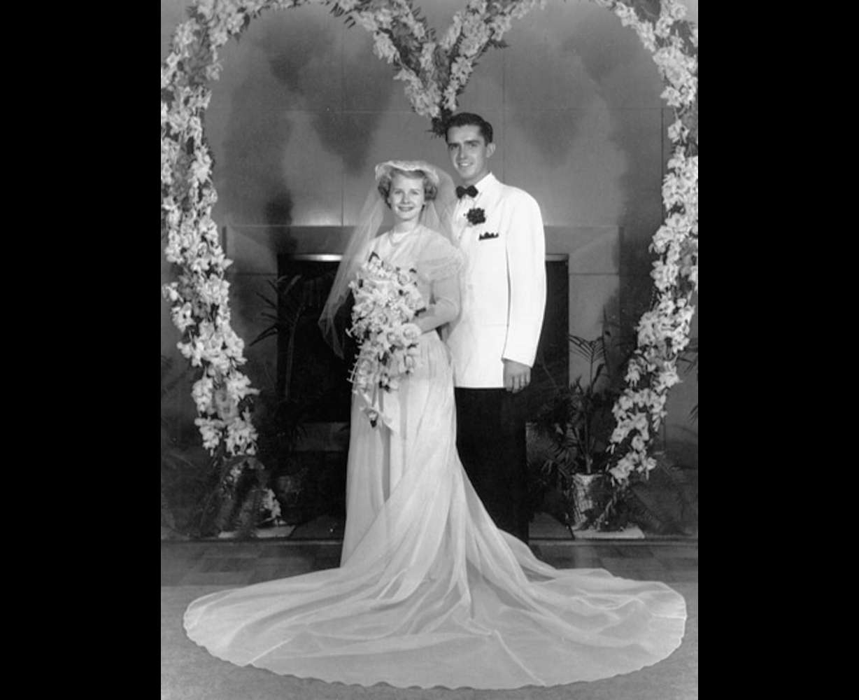 M. Russell Ballard and Barbara Bowen Ballard smile in an official wedding photo from 1951.