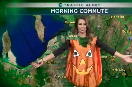 KSL traffic anchor Haley Smith wears a pumpkin costume while reporting traffic times as part of the nine different Halloween costumes she wore during Thursday Oct. 31, 2019's morning broadcast. (Photo courtesy of KSL TV)