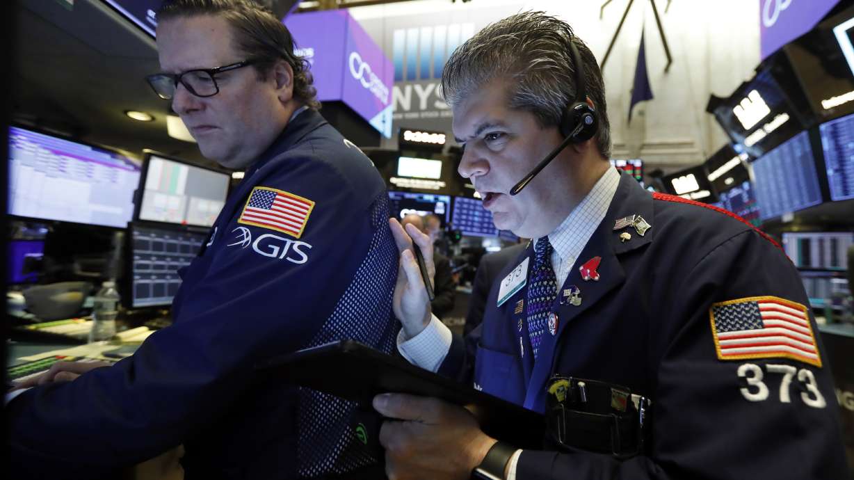 Stocks hit records as strong jobs report calms trade worries