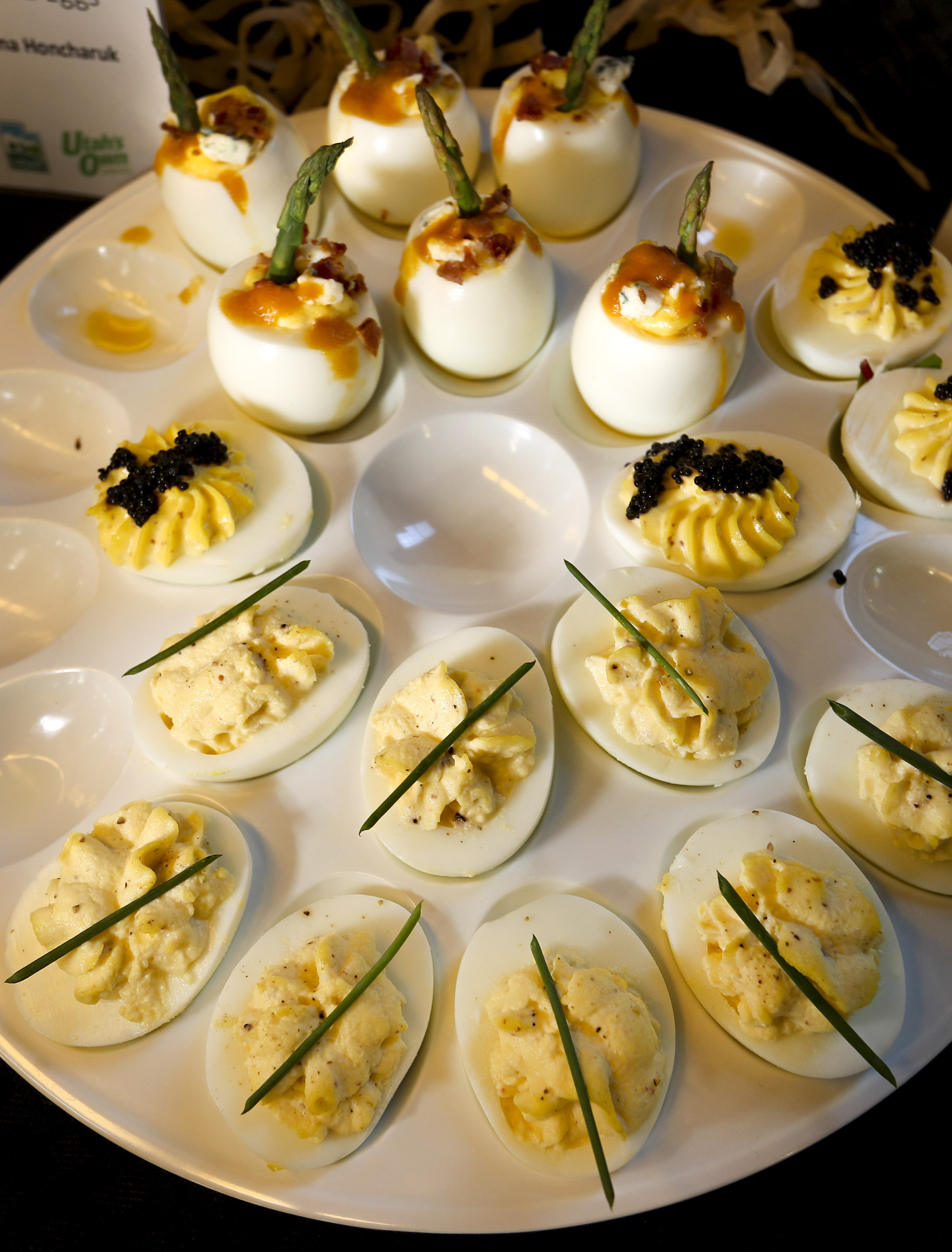 Deviled eggs from chef Oksana Honcharuk that includes bacon blue cheese, black lump fish and crab meat are ready to sample during an event promoting Utah Egg Producer Day at the Utah State Fairpark in Salt Lake City on Friday, Nov. 1, 2019. The event closely coincides with National Deviled Egg Day which is Nov. 2, 2019. Egg production has grown over the years and contributes an estimated $75 million to Utah’s economy. (Steve Griffin, KSL)
