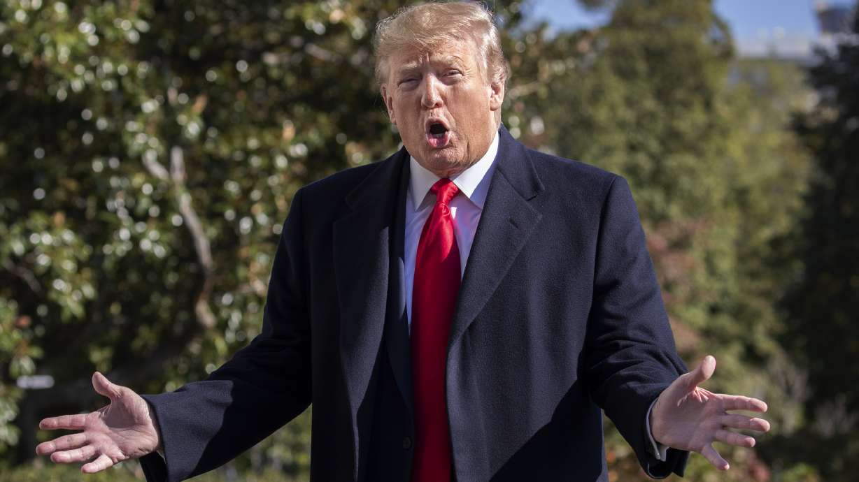 The Latest: Giuliani associate will cooperate with inquiry