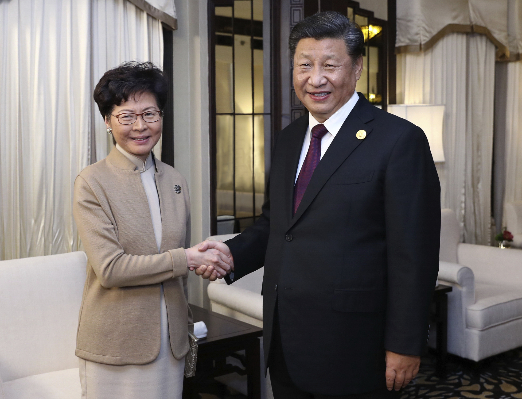 Hong Kong leader says she has Xi's backing to tackle unrest