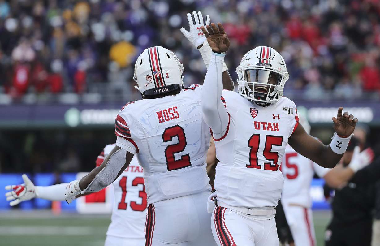 Former Utah running back Zack Moss with quarterback Jason Shelley.