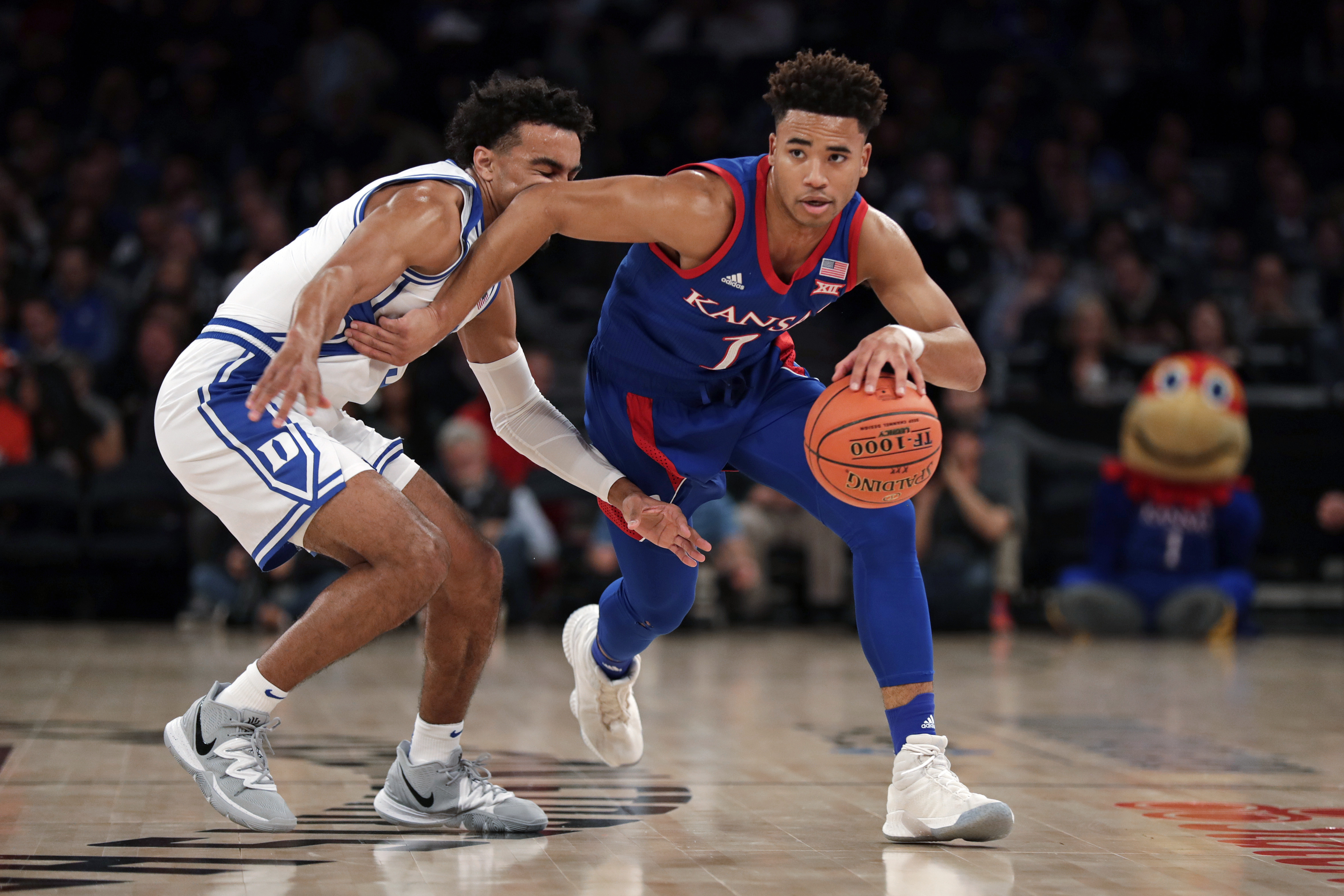 No. 4 Duke edges third-ranked Kansas 68-66