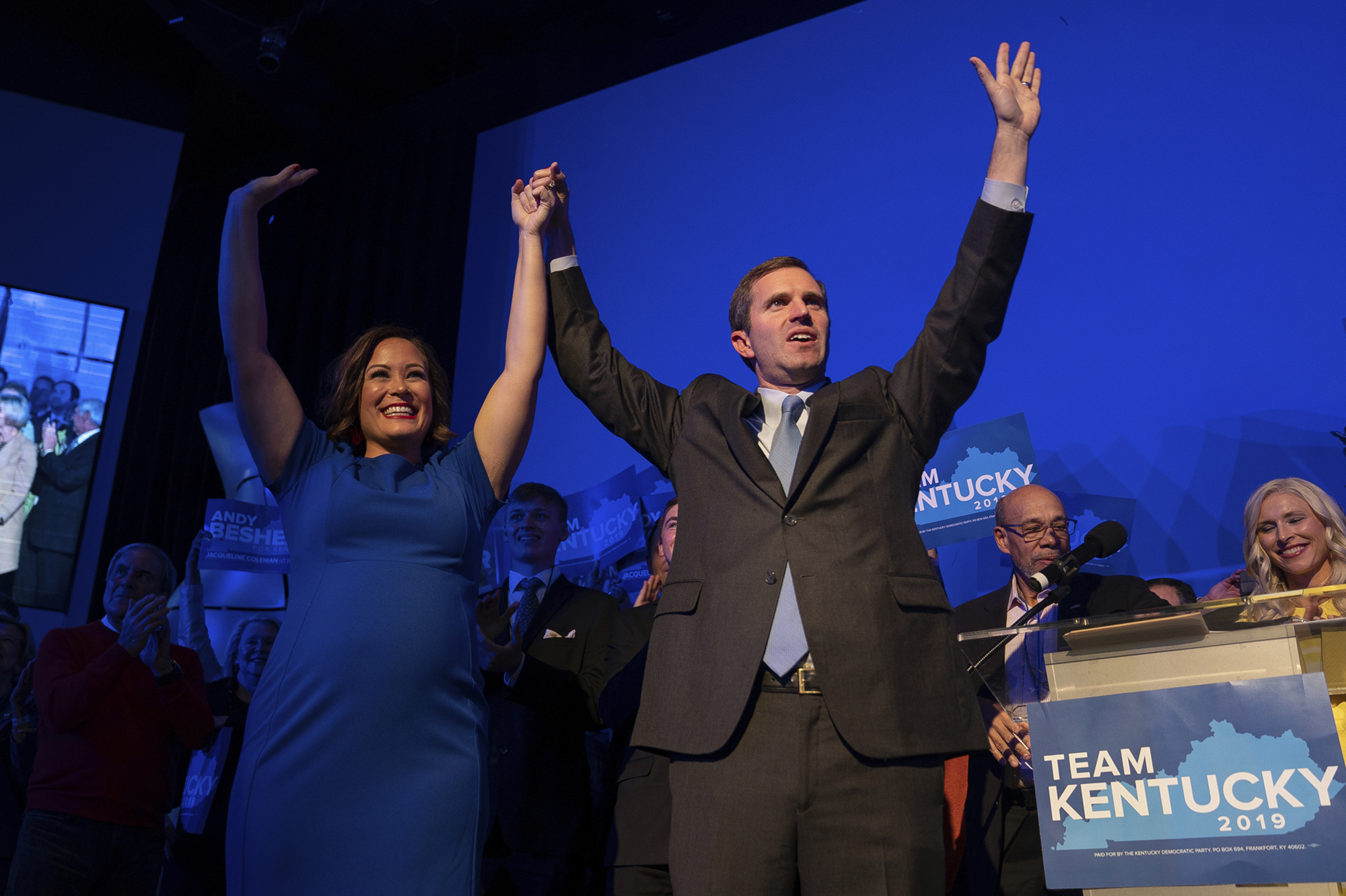 Democratic gubernatorial candidate and Kentucky Attorney General Andy Beshear, along with lieutenant governor candidate Jacqueline Coleman, acknowledge supporters at the Kentucky Democratic Party election night watch event, Tuesday, Nov. 5, 2019, in Louisville, Ky. (Bryan Woolston, AP Photo)