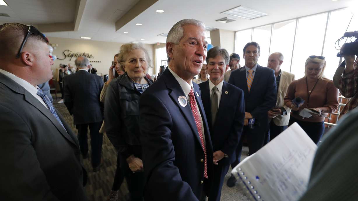 Donald Trump works up a sweat at a Louisiana campaign rally