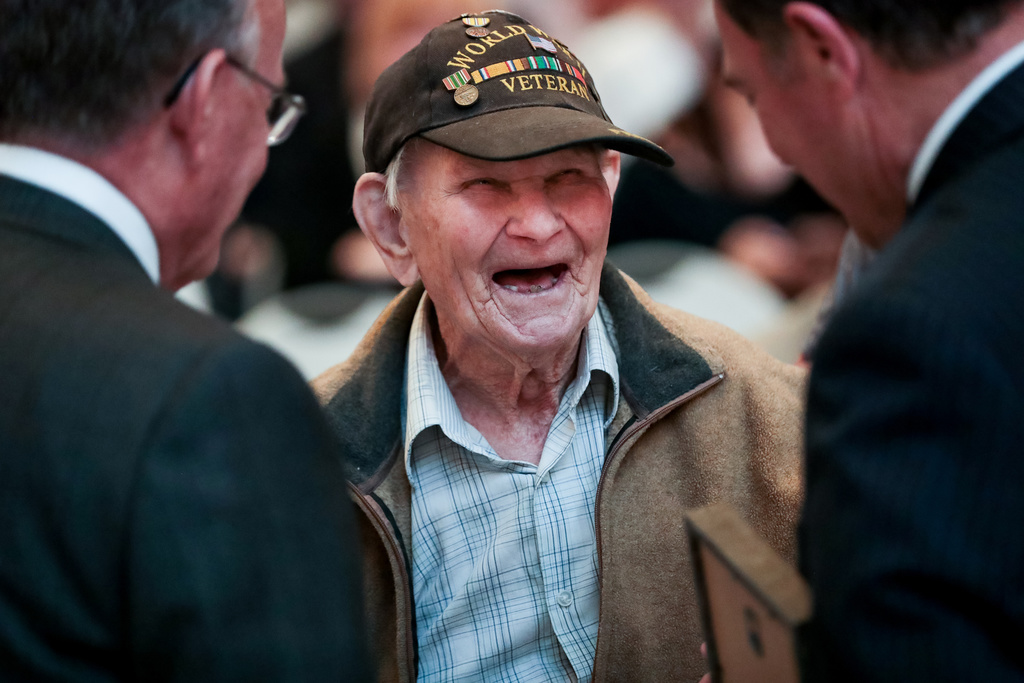 Woodrow Wilson New, 101, of Clinton, greets Utah Senate President Stuart Adams, R-Layton, left, and Gov. Gary Herbert, right, during a ceremony honoring centenarian veterans at the Capitol in Salt Lake City on Tuesday, Nov. 5, 2019. (Photo: Spenser Heaps, KSL)