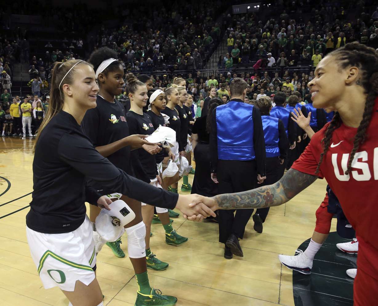Oregon's Sabrina Ionescu, left, exchanges hats with U.S.'s Seimone Augustus before their women's exhibition basketball game in Eugene, Ore., Saturday, Nov. 9, 2019. (Photo: Chris Pietsch, AP)