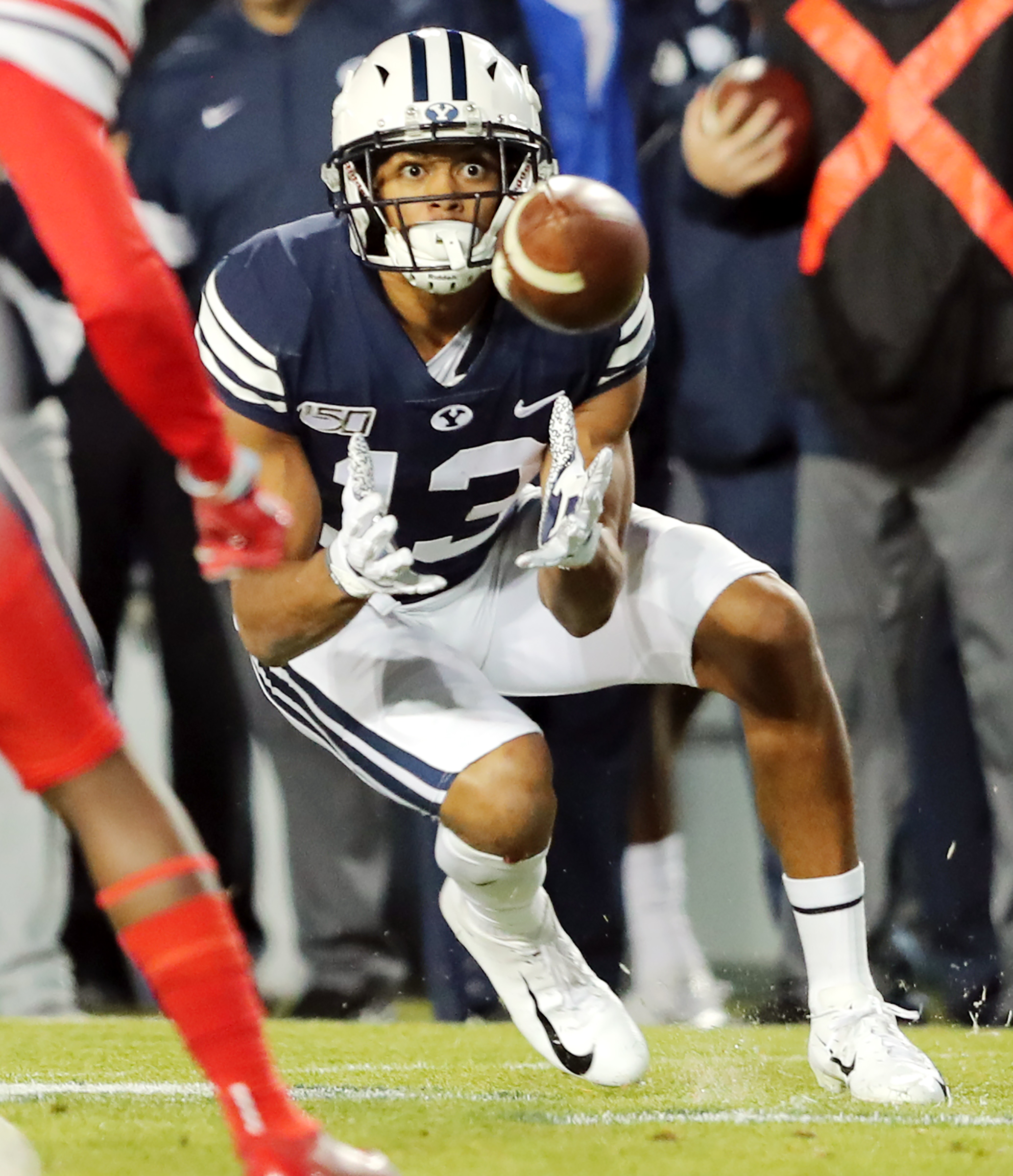 Brigham Young Cougars wide receiver Micah Simon (13) eyes the ball on a pass reception as BYU and Liberty play an NCAA football game in Provo, Utah on Saturday, Nov. 9, 2019. (Photo: Scott G Winterton, KSL)