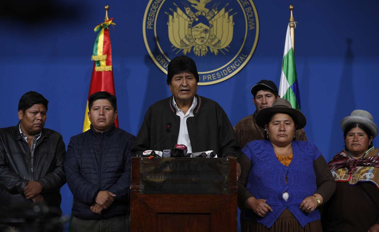 Bolivia's President Evo Morales, center, speaks during a press conference at the military base in El Alto, Bolivia, Sunday, Nov. 10, 2019. Hours later Morales announced his resignation under mounting pressure from the military and the public after his re-election victory triggered weeks of fraud allegations and deadly protests. (Photo: Juan Karita, AP Photo.)