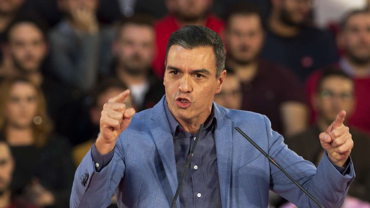 Socialists, left-wing party reach coalition deal in Spain
