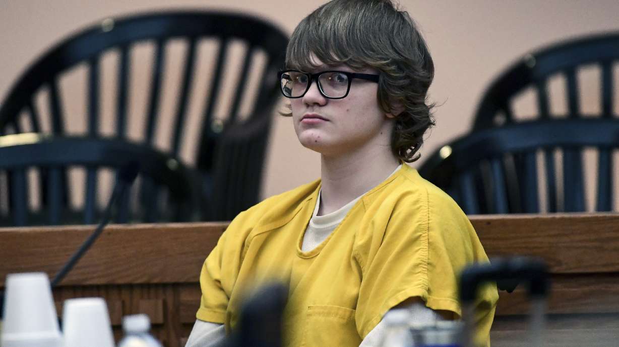 The Latest: Teen in school shooting charged with escape
