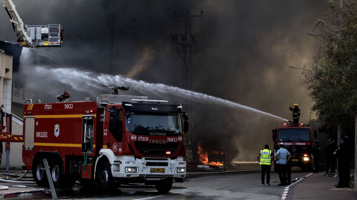 As rockets rain down, Israel intensifies its strikes in Gaza
