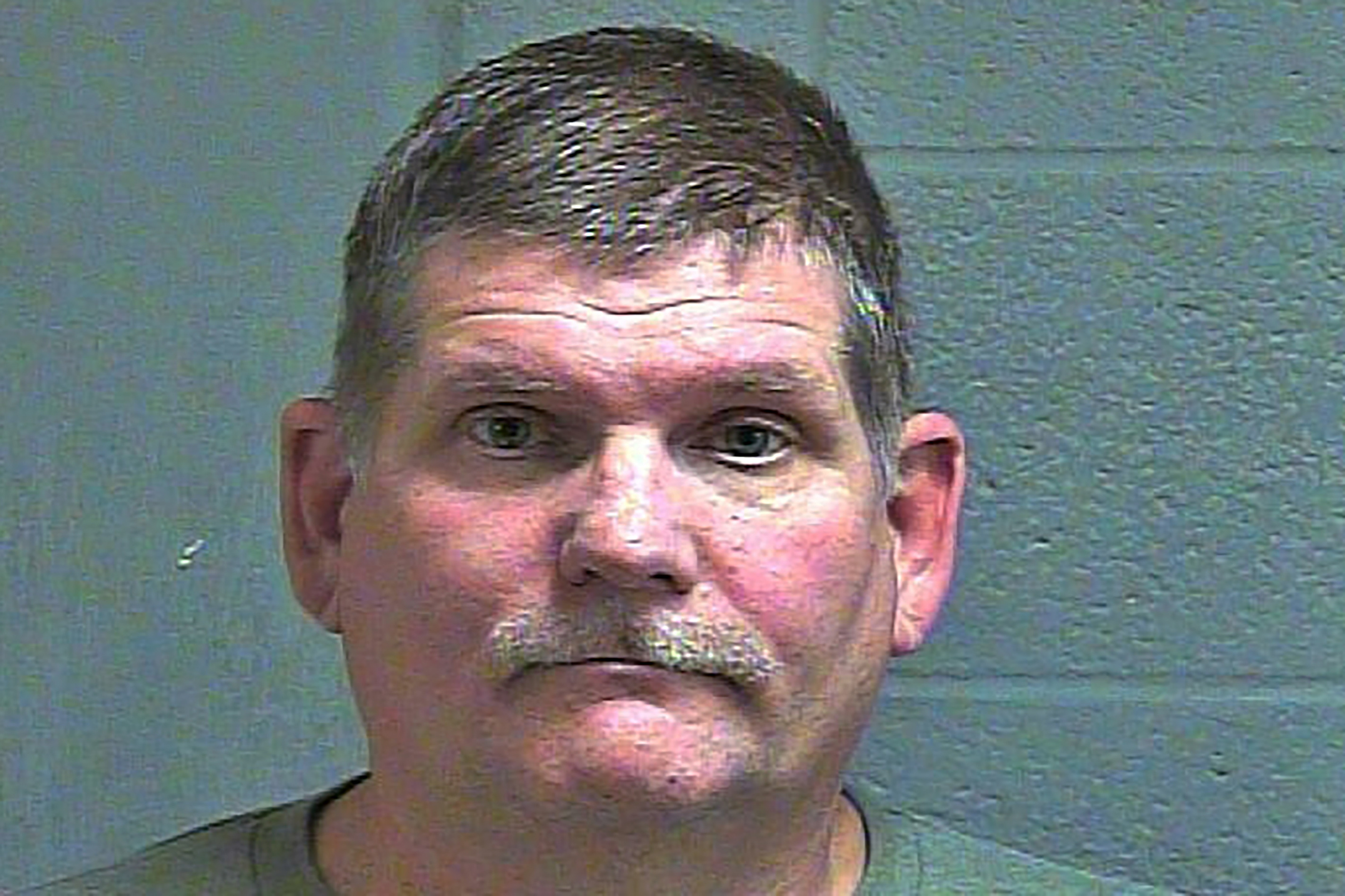 Gun rights activist facing charges for rifle in restaurant