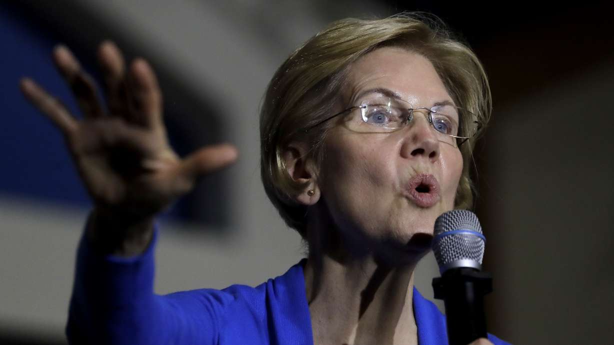 Wall Street feuds with Warren, much to her apparent delight