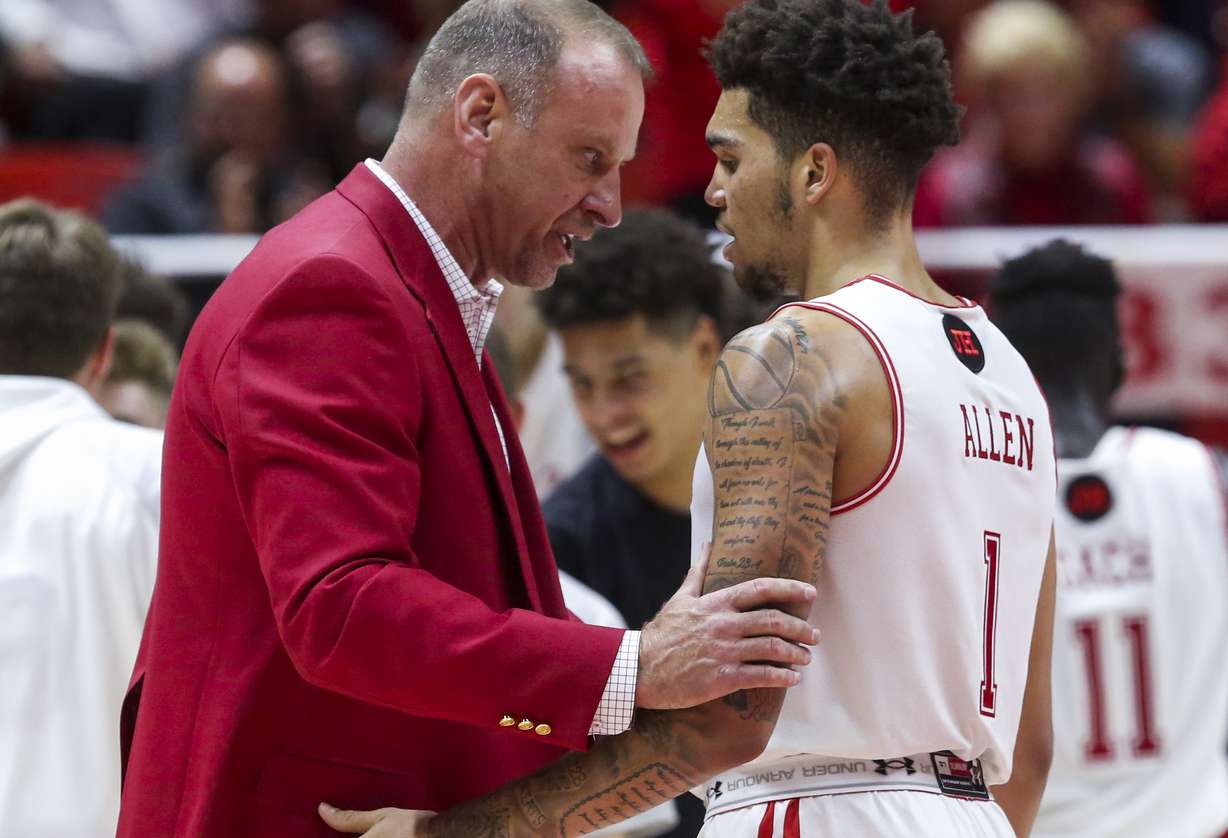 Utah Utes head coach Larry Krystkowiak, left, talks to forward Timmy Allen (1) during the second half of an NCAA men's basketball game at the Jon M. Huntsman Center on the University of Utah campus in Salt Lake City on Friday, Nov. 15, 2019. With the team's 73-69 win over the Minnesota Golden Gophers, Krystkowiak joined the 200-win club. (Photo: Colter Peterson, KSL)