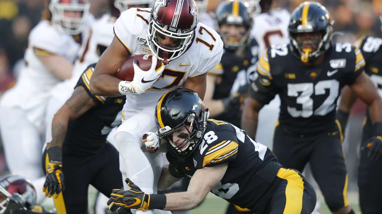 No. 23 Iowa hands No. 7 Minnesota its first loss, 23-19