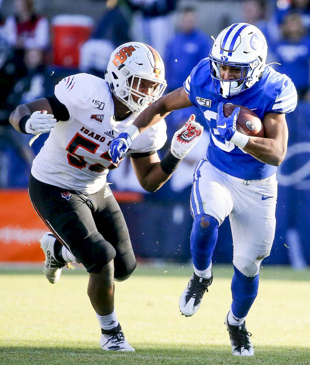 Brigham Young Cougars running back Sione Finau (35) runs past Idaho State Bengals linebacker Darian Green (52) at LaVell Edwards Stadium in Provo on Saturday, Nov. 16, 2019. The freshman had a career day, finishing with 102 yards on 16 carries with a touchdown. (Photo: Laura Seitz, KSL)