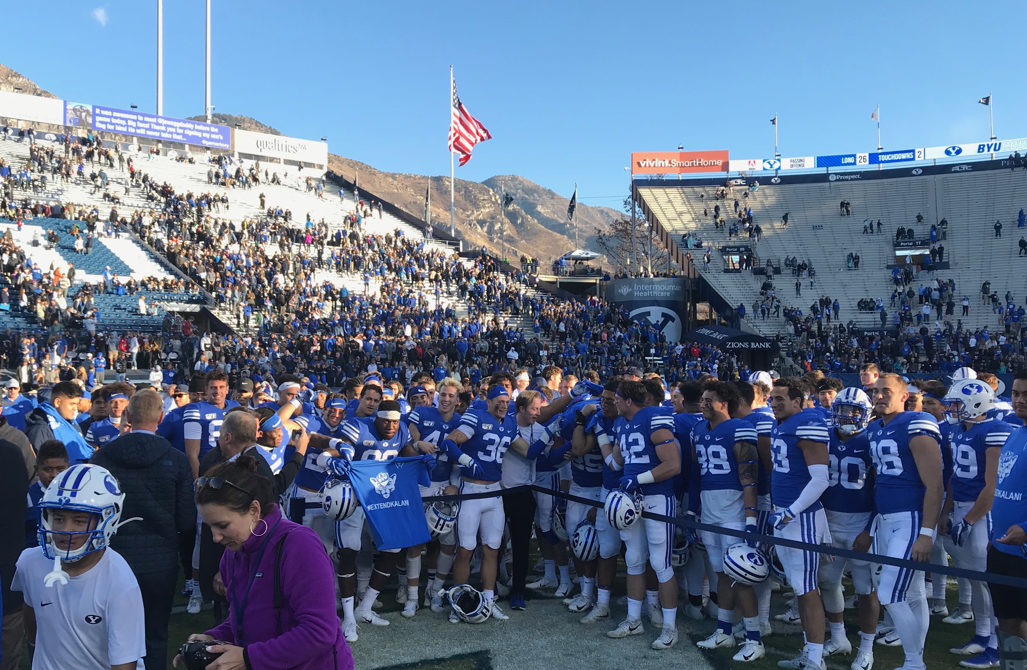 JJ Nwigwe, left, holds up a t-shirt with the worlds #ExtendKalani during a postgame celebration after BYU's 42-10 win over FCS Idaho State, Saturday, Nov. 16, 2019 at LaVell Edwards Stadium. (Photo: Sean Walker, KSL.com)