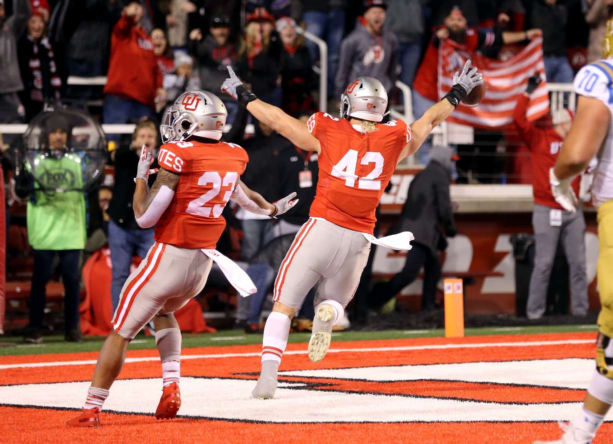 Utah Utes defensive end Mika Tafua (42) celebrates a touchdown after picking up a UCLA fumble as Utah and UCLA play a college football game in Salt Lake City at Rice-Eccles Stadium on Saturday, Nov. 16, 2019. (Photo: Scott G Winterton, KSL)