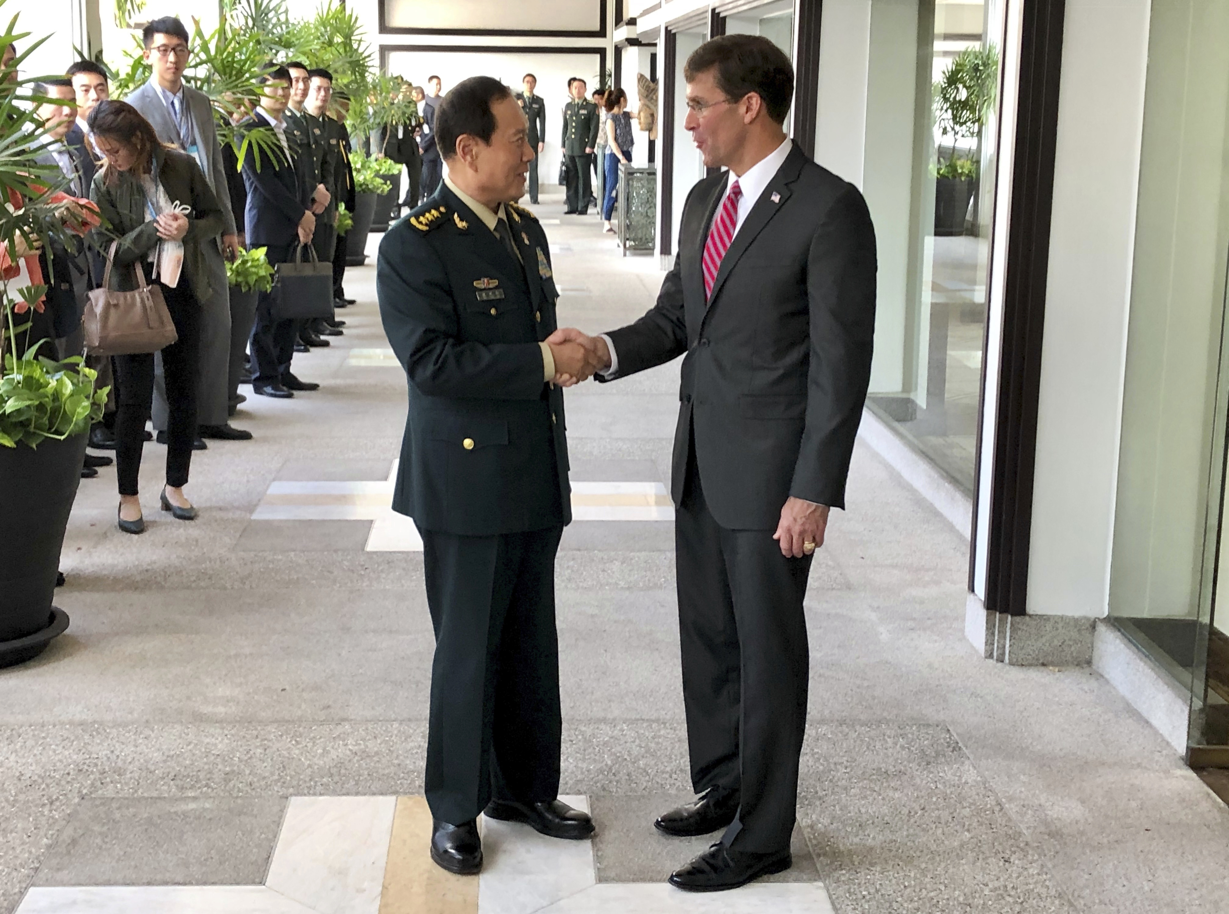 China urges US to “stop flexing muscles” in South China Sea